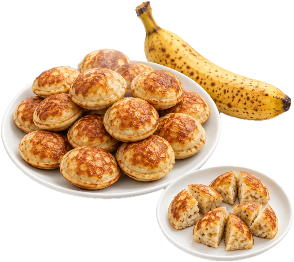 Bananenpoffertjes, een paar in vieren gesneden op een babybordje